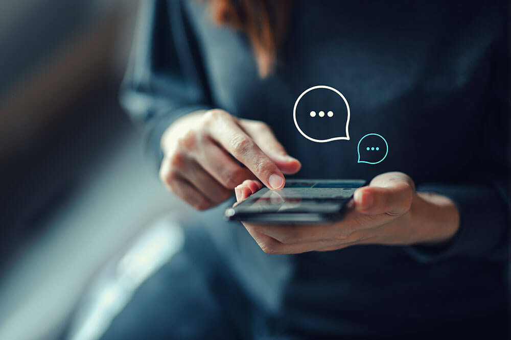 person on phone getting messages<br />
